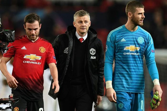 Honeymoon over: Ole Gunnar Solskjaer (centre) suffered his first defeat as Manchester United caretaker manager