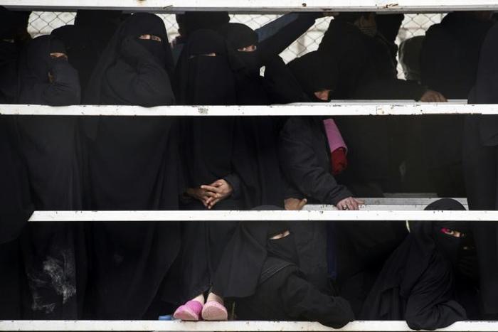 Thousands of haggard women and children have fled the Islamic State's last enclave as the US-backed Syrian Democratic Forces ready a final assault on remaining jihadist diehards, maybe as early as next week