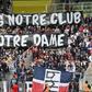 Paris Saint-Germain's supporters hold a banner reading "PSG is our club, Paris is our Lady" ahead of the league match at Nantes