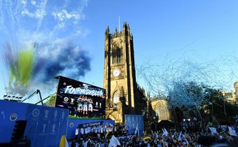 Manchester City celebrated their domestic treble with an open-top bus parade on Monday, drawing an estimated 100,000 fans to the streets of the city centre