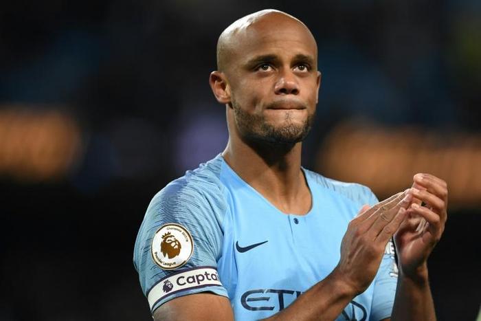 Vincent Kompany applauds the fans after Manchester City's crucial win against Leicester