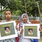 Bangladeshi women hold posters of murdered schoolgirl Nusrat Jahan Rafi at a protest in Dhaka. Authorities have ordered state-funded Islamic seminaries to appoint female mentors to prevent violence against women and children