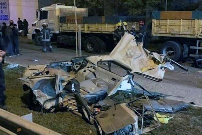 Seen here is the wreckage of a car in which four people were killed following a police pursuit in San Miguel del Monte, Argentina -- 12 police officers have been suspended over the incident