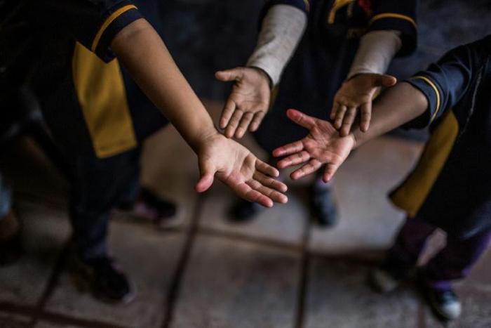 Organizers of a "catwalk" of adoptable children and adolescents in Brazil are on the defensive following sharp criticism of the event, held in a shopping mall