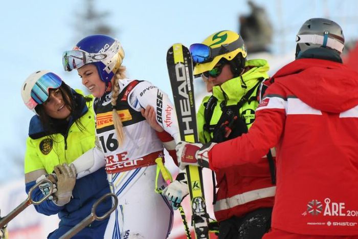 Lindsey Vonn was helped to her feet after careering into the safety netting