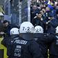 Schalke's supporters face police officers during a heated local derby against Borussia Dortmund on Saturday