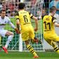 Marco Reus inspired Borussia Dortmund to a crucial win over Freiburg in the Bundesliga on Sunday
