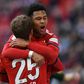 Bayern Munich forwards Thomas Mueller and Serge Gnabry celebrate