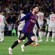 Barcelona's Lionel Messi celebrates after scoring his team's third goal against Liverpool