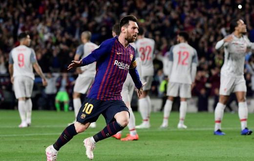 Barcelona's Lionel Messi celebrates after scoring his team's third goal against Liverpool