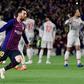 Barcelona's Lionel Messi celebrates after scoring his team's third goal against Liverpool