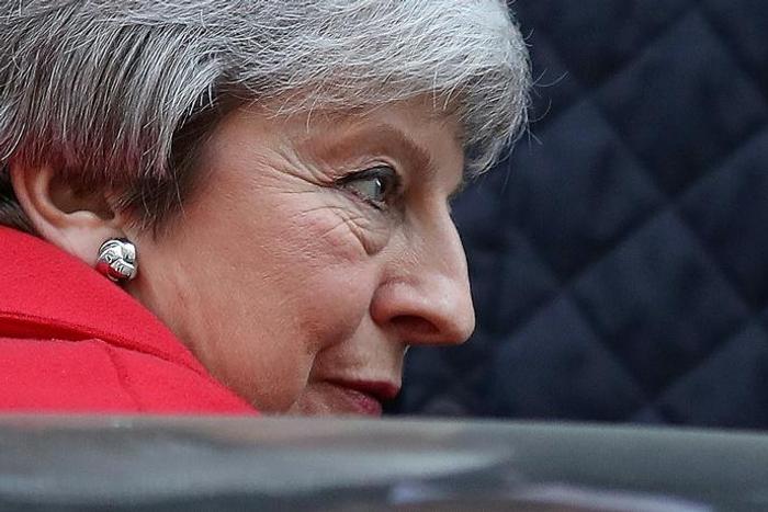 Britain's embattled Prime Minister Theresa May will ask British lawmakers to approve a three-step Brexit plan