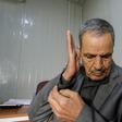 An Iraqi who turned deaf tests his hearing aid at Jumhuri hospital, a specialised centre in the battle-scarred Iraqi city of Mosul