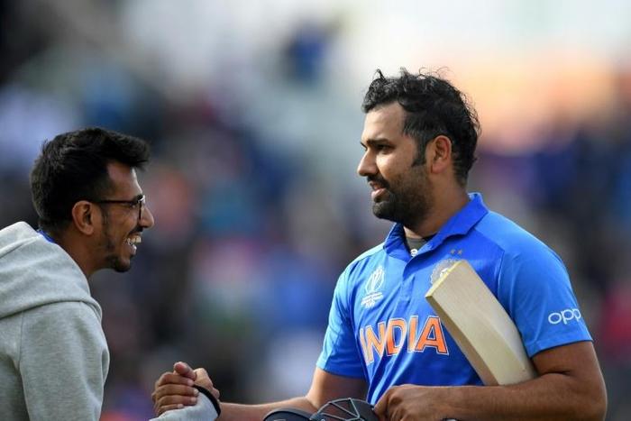 Yuzvendra Chahal (left) and Rohit Sharma both played a key role as India beat South Africa by six wickets in the World Cup