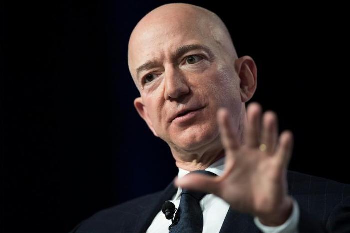 In a post on blogging platform Medium Thursday, Jeff Bezos (seen) said Enquirer publisher American Media Inc (AMI), led by David Pecker, approached him with a threat to publish the photos if he did not halt an investigation into the motives behind that...