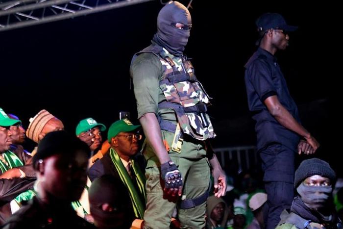 Security agents at a rally staged by Issa Sall in Dakar on February 3