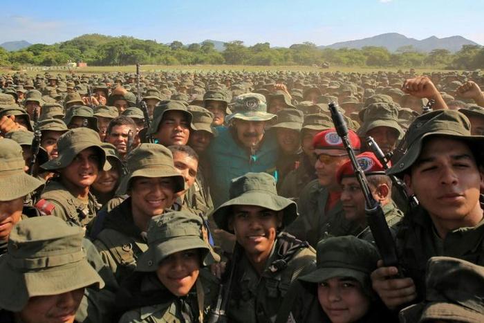 Venezuela's President Nicolas Maduro (C) posing with troops, in a handout photo released by the Venezuelan presidency