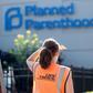 A Coalition For Life sidewalk counselor, an organization dedicated to ending abortions, stands outside of the Planned Parenthood Reproductive Health Services Center in St Louis, Missouri, May 31, 2019