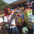 Efia Odo shows love to physically challenged persons