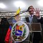 Venezuelan opposition leader and self-declared interim president Juan Guaido talks during a meeting with professionals and technicians at the Caraca's Chamber of Commerce Auditorium, in Caracas on May 16, 2019