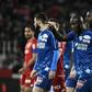 Amiens' defender Prince Gouano points to supporters after hearing racists insults during the French Ligue 1 match