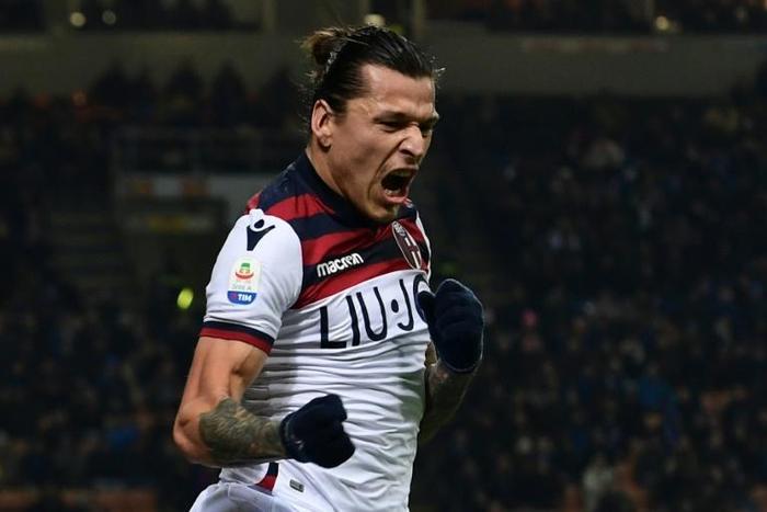 Bologna striker Federico Santander, pictured here celebratig a goal at Inter Milan, snatched a win against Napoli on Saturday