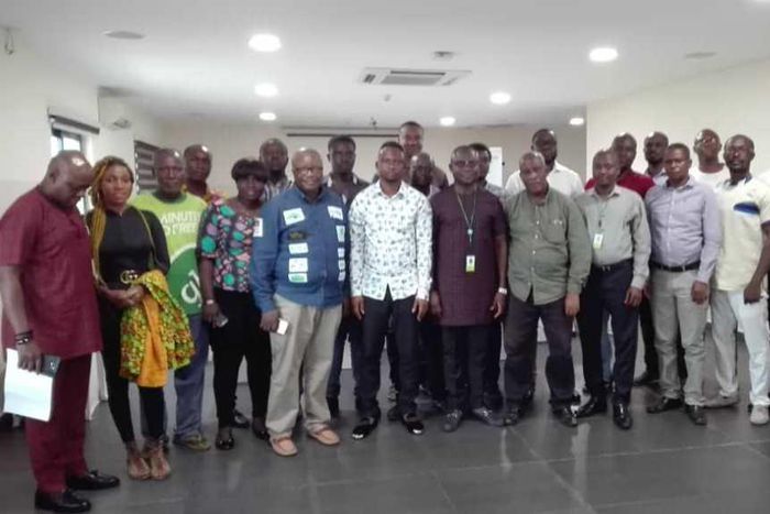 A group photo of the operators and senior Glo officials.