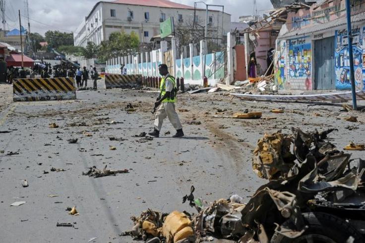 Somali forces stand guard outside a hotel near the presidential palace in Mogadishu last year after a Shabaab attack