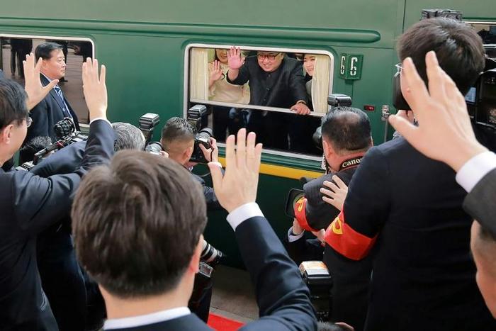 Kim Jong Un (C) has made the trip to Beijing several times in his personal train