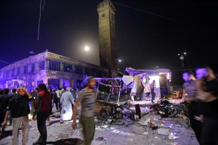Air strikes by Syrian government or Russian aircraft rip though market stalls in the town of Maarat al-Numan, the latest to hit the jihadist-controlled northwest