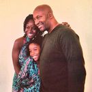 Late John Singleton, Akosua Busia and their child