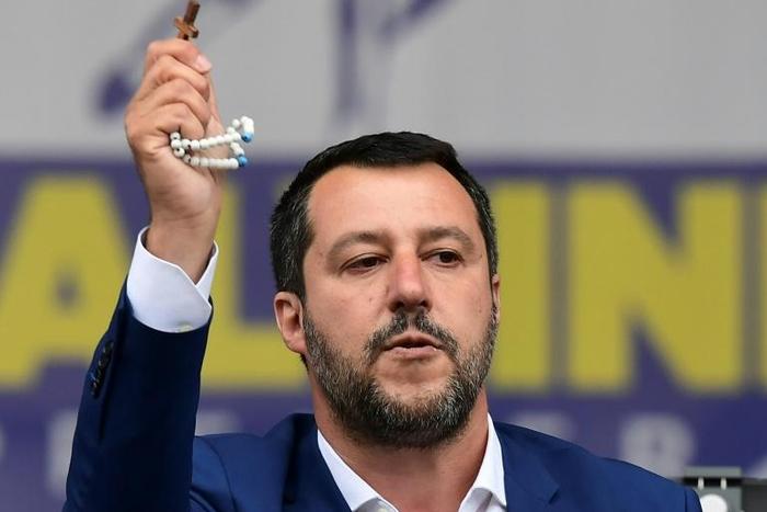 The interior minister described himself as a "good Catholic" after sparking an outcry for holding up a rosary during a rally of the European far right in Milan on Saturday