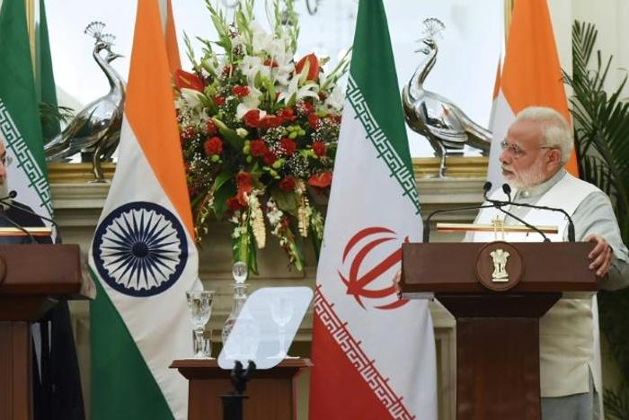 Iranian President Hassan Rouhani meets Indian Prime Minister Narendra Modi on a February 2018 visit to New Delhi