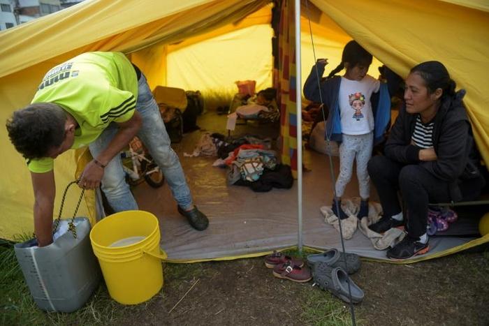 Venezuelan migrants at a humanitarian camp in Bogota, Colombia, which has been hosting people fleeing the political crisis in neighbouring Venezuela