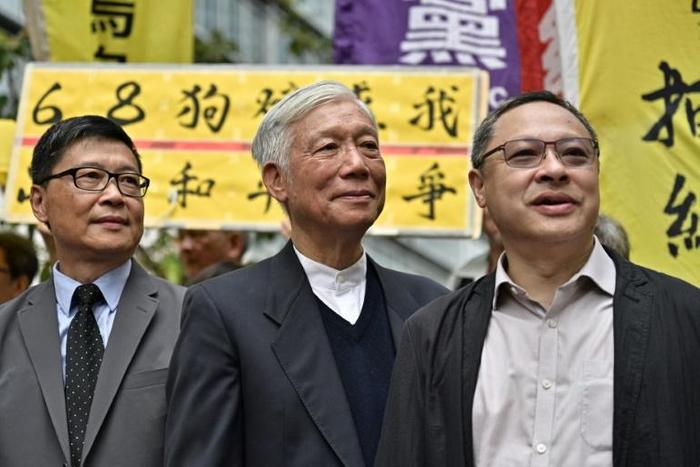 Sociology professor Chan Kin-man (L), baptist minister Chu Yiu-ming (C) and law professor Benny Tai (R) are among the most prominent activists facing sentencing