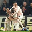 Manchester United striker Romelu Lukaku (centre) celebrates his second goal against Crystal Palace
