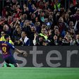 Luis Suarez celebrates scoring Barcelona's first goal against Liverpool on Wednesday.