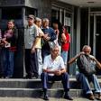 Venezuela's international banking under sanctions pressure: elderly people waiting for their pension monthly payment outside a bank in Caracas