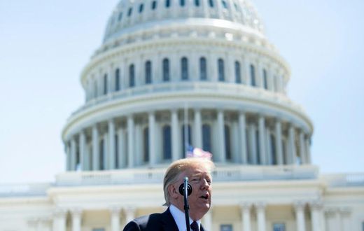 Donald Trump signed an order prohibiting purchase of equipment from companies that pose 'an unacceptable risk to the national security'
