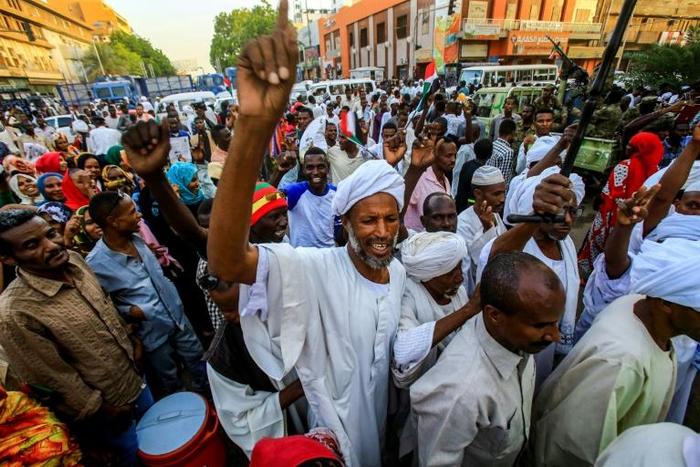 Sudanese supporters of the ruling military council rallied in central Khartoum on Friday