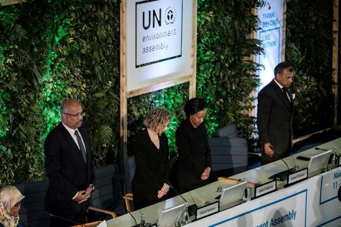 Delegates observed a minute's silence at the meeting's start