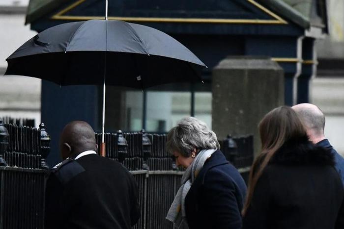 May is trying to reassure investors