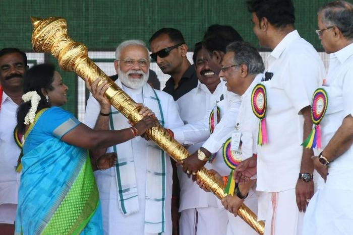 Prime Minister Narendra Modi (C) is seeking a second term but opinion polls have suggested ebbing support for his right-wing BJP