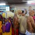 Indian pilgrims seek out the computerized lost and found centres after they lose their relatives in the vast crowds at the Kumbh Mela festival in Allahabad