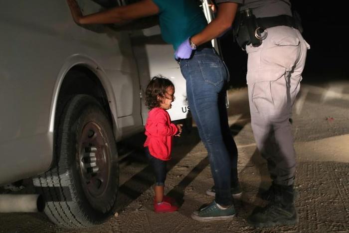 "I could see the fear on their faces, in their eyes," Moore said of the migrants stopped by US border officials
