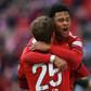 Bayern Munich forwards Thomas Mueller and Serge Gnabry celebrate