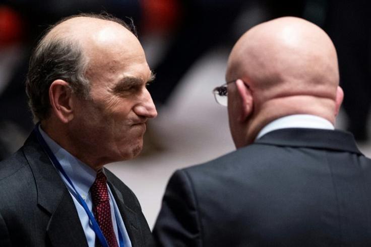 US envoy on Venezuela Elliott Abrams (L) speaks to Russian Ambassador Vassily Nebenzia ahead of a vote on a US draft resolution calling for new presidential elections in Venezuela -- Russia and China vetoed the text