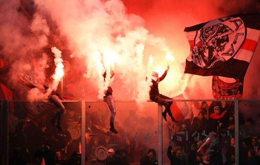Ajax fans celebrate their team winning their 34th Dutch title on Wednesday