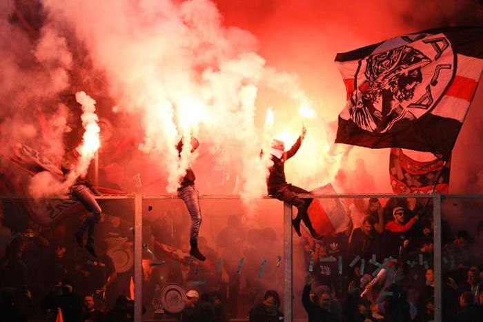 Ajax fans celebrate their team winning their 34th Dutch title on Wednesday