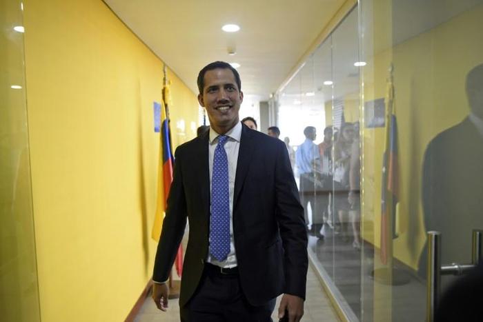 Venezuelan opposition leader and self-declared president Juan Guaido arrives for an interview with AFP in Caracas on May 6, 2019